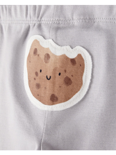 זוג בגדי גוף ומכנס עוגייה